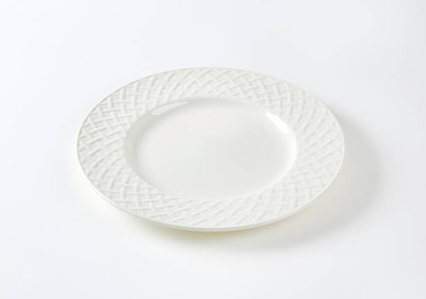 istock White porcelain plate with decorative rim 503463866