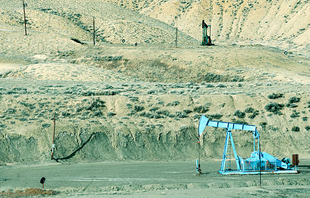 istock Oil drilling rigs in rural central Wyoming 503466480
