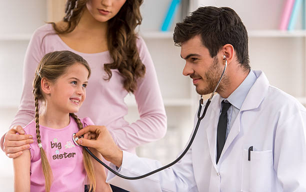 istock Child and pediatrician 503482552