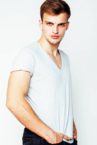 istock young handsome man on white background gesturing, pointing, posing emotional 503485470