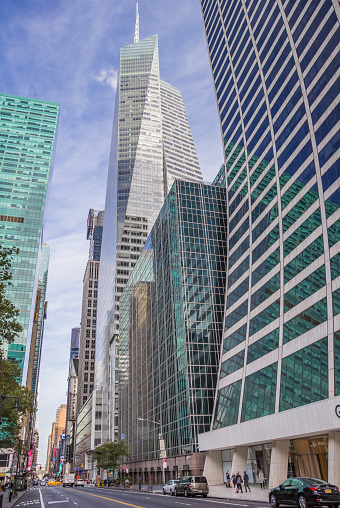 New York City, USA - September 27, 2015: The Bank of America Tower at One Bryant Park is a 1,200 ft (366 m) skyscraper in the Midtown area of Manhattan in New York City, United States. It is located on Sixth Avenue, between 42nd and 43rd Streets, opposite Bryant Park.