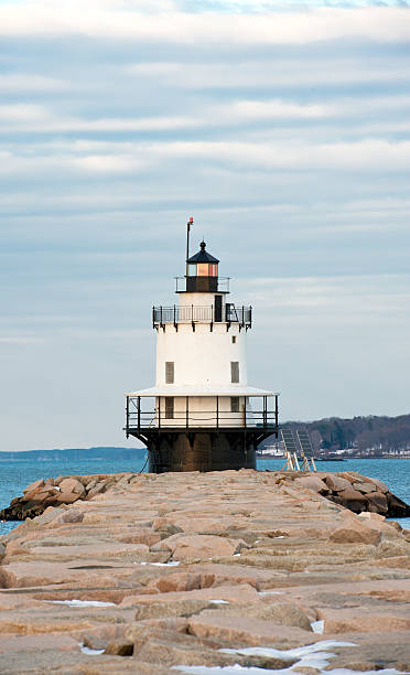 istock Maine lighthouse in winter 503487424