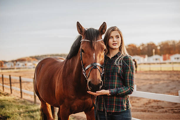 istock Young woman and her horse 503488232