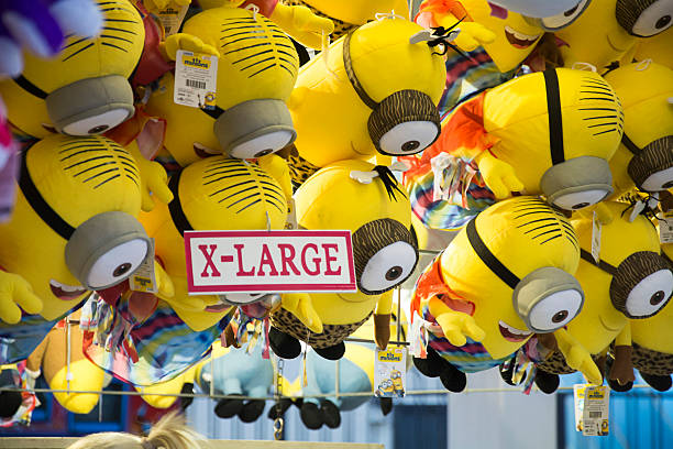 Dallas, Texas USA - October 11, 2015: Minion Stuffed animal prizes waiting to be won at the midway carnival games at the texas state fair