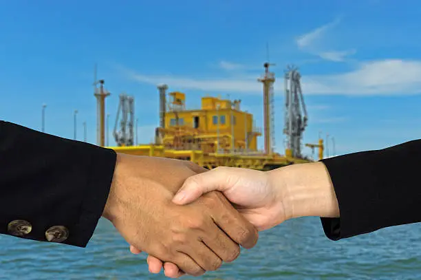 rig background with man and woman shakehands