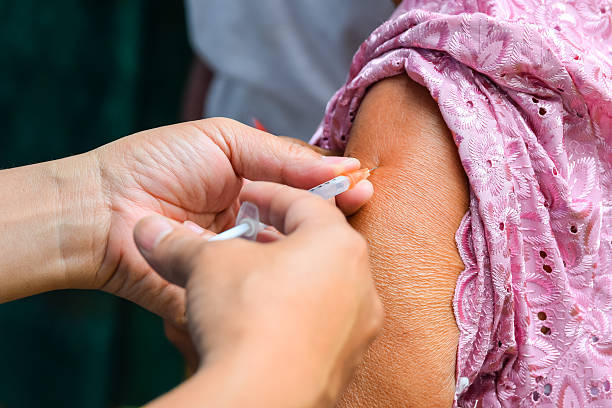 istock Doctor giving an injection to a patient 503490239