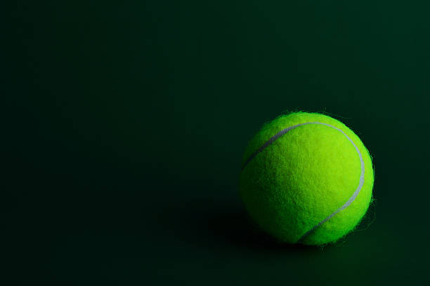 istock tennis ball on green background 503490245