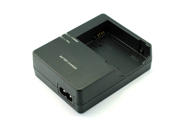 istock camera battery charger isolated on white 503491257