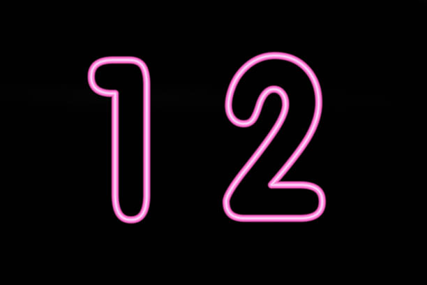 istock Pink neon digit 1 and 2 on black background 503491529