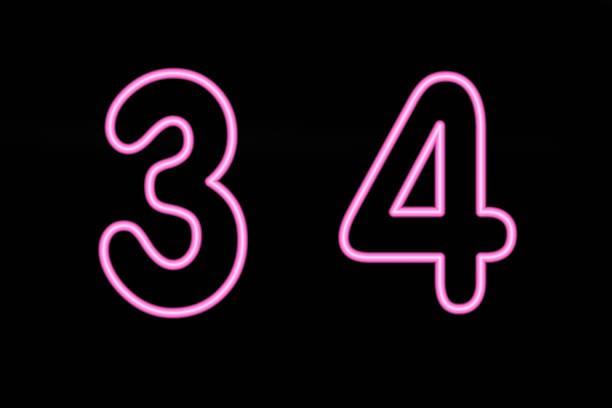 istock Pink neon digit 3 and 4 on black background 503491533