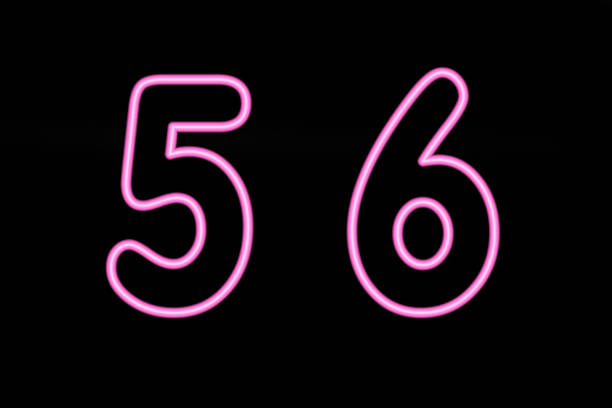 istock Pink neon digit 5 and 6 on black background 503491535