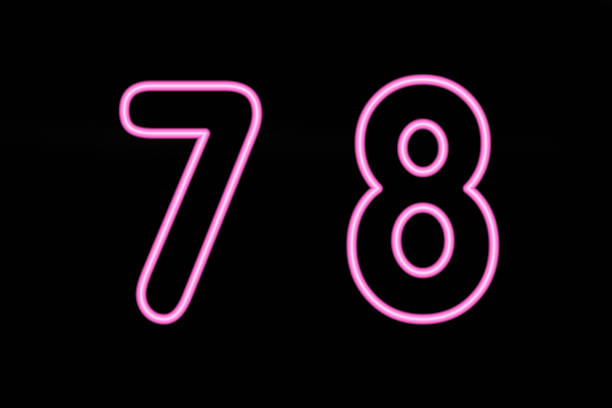 istock Pink neon digit 7 and 8 on black background 503491539