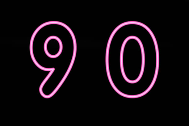 Pink neon digit nine and zero on black background