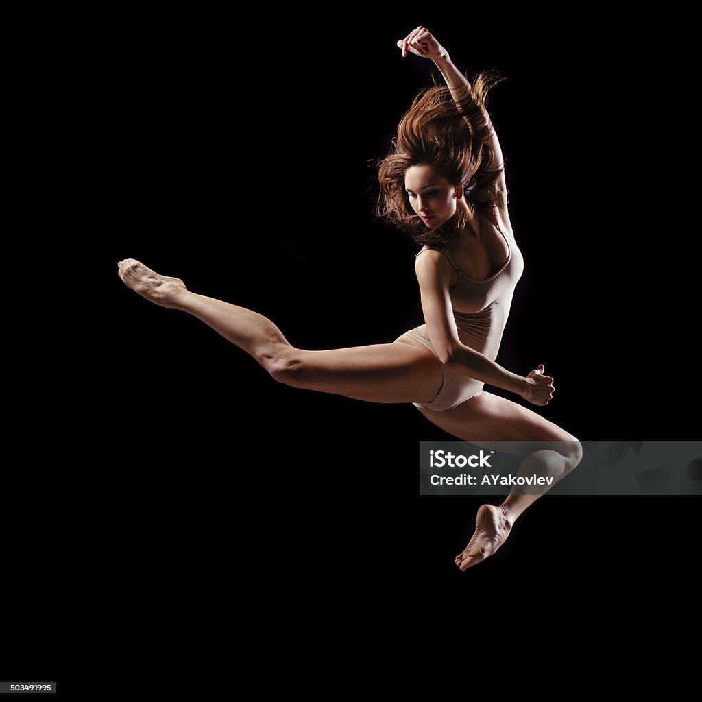 The dancer young beautiful dancer posing on studio background Gymnastics Stock Photo