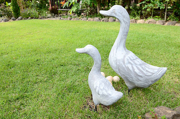 istock Duck & egg statues in garden 503492535