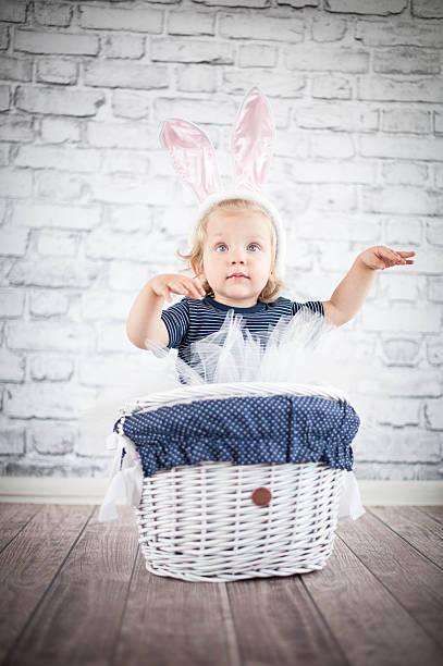 istock Cute baby bunny in the basket 503492847