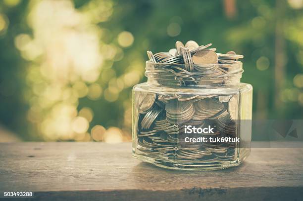 Money In The Glass With Filter Effect Retro Vintage Style Stock Photo - Download Image Now