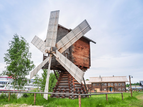 Wooden windmill in the rural town of Mandrogi, Russia.