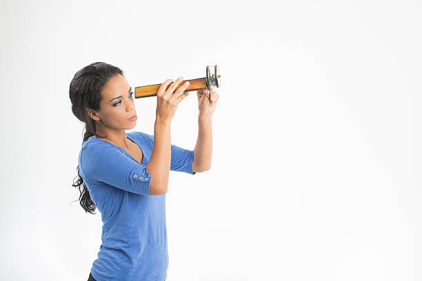 Beautiful emotional woman holding trombone