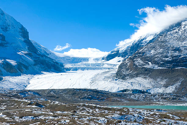 Athabasca glacier Columbia Icefields, Canada View of mountains and the icefields along the Icefield Highway in Jasper National Park, Alberta. jasper national park stock pictures, royalty-free photos & images