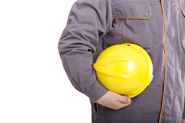 istock isolated portrait engineer with yellow hardhat 503507358
