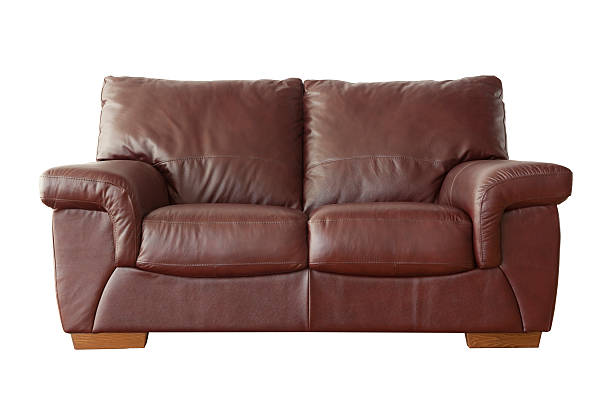istock Elegant brown leather sofa isolated on white background 503509568