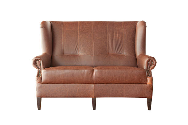 istock Elegant brown leather sofa isolated on white background 503509802