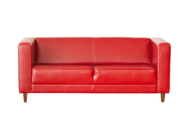istock Elegant red leather sofa isolated on white background 503509926