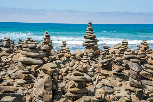 istock Pyramid of stones on the beach 503510782