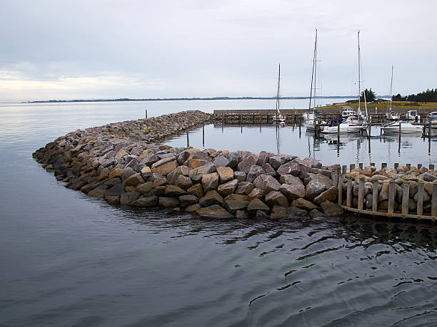 istock Modern breakwater protecting a port 503515658