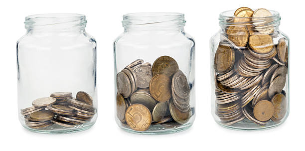 istock Glass jars with coins 503520762