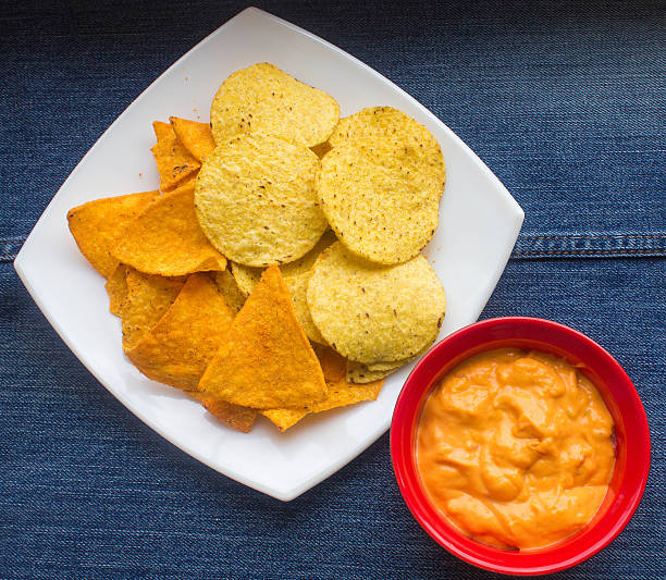 istock nachos with cheese sauce 503524661