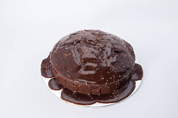 istock chocolate cake iced with granache and grated chocolate 503535598