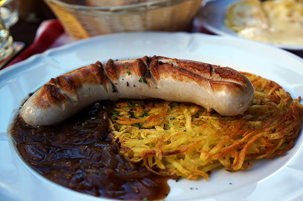 Pork sausage and onion sauce with Rosti