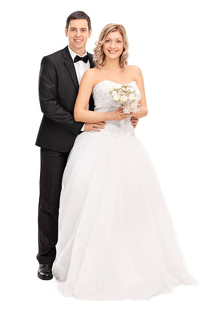 istock Young bride and groom posing together 503538542