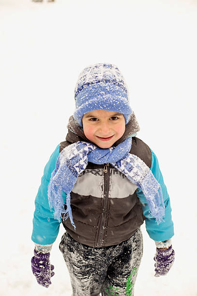 istock Little boy and the snow 503538870