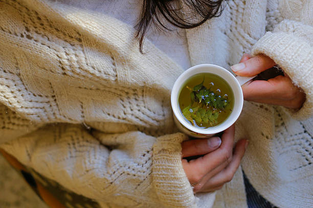 istock Sage tea with woman hand 503538950