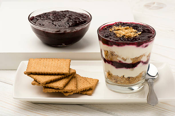 istock Healthy dessert with natural yogurt, biscuits and jam. 503540044