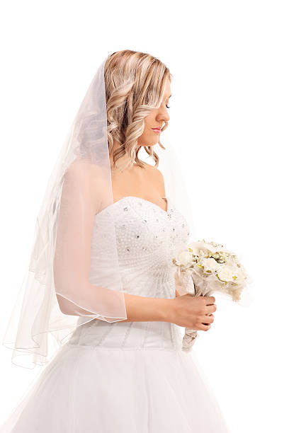 istock Worried bride walking with a wedding flower 503540570