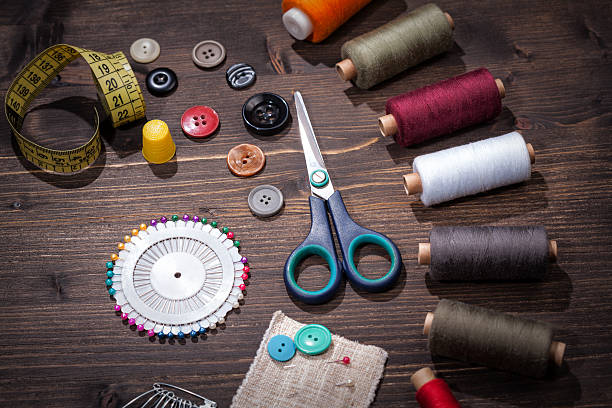 istock Vintage set of threads, scissors and buttons 503542598