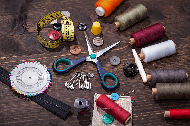 istock Vintage set of threads, scissors and buttons 503542644