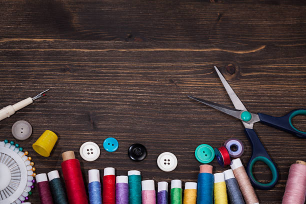 istock Vintage set of threads, scissors and buttons 503542694