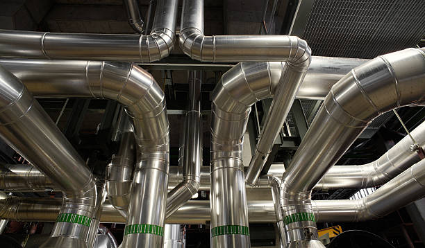 istock different size and shaped pipes and valves 503542834
