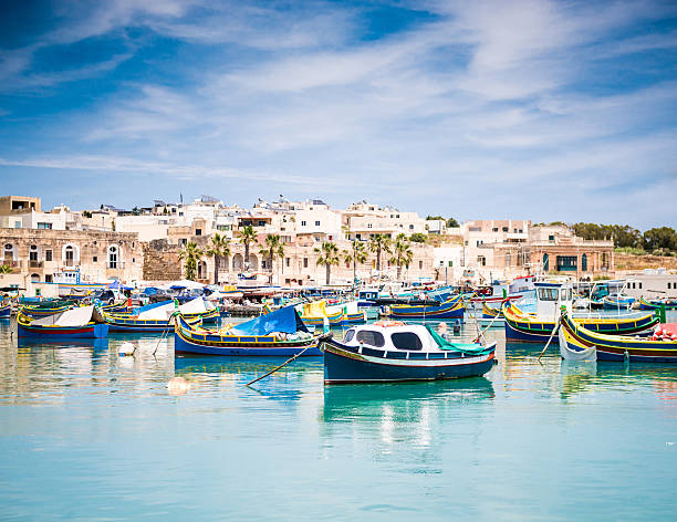 istock boats in Marsaxlokk harbor 503543922