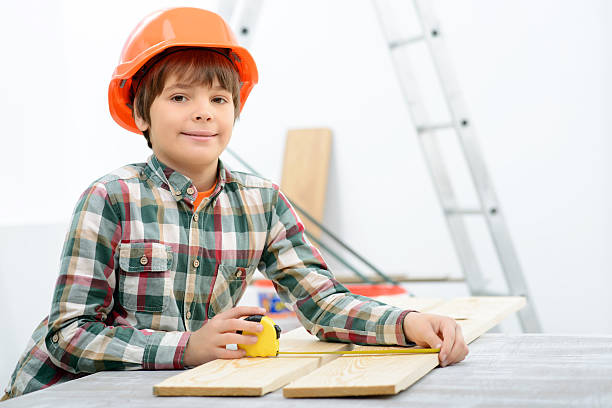 istock Positive boy holding tape measure 503546514