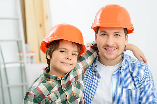 istock Happy father and son doing renovation 503547414