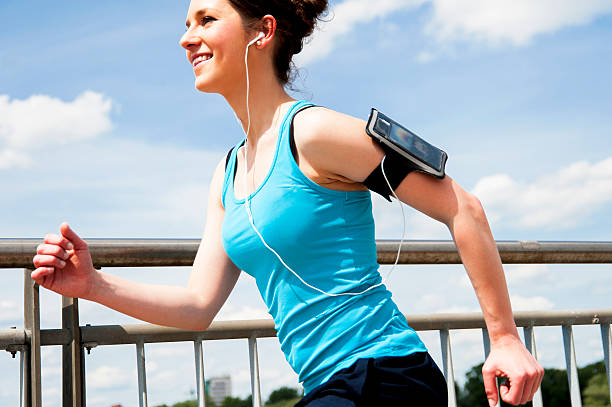 istock Young girl running, over the river by the bridge. 503553852