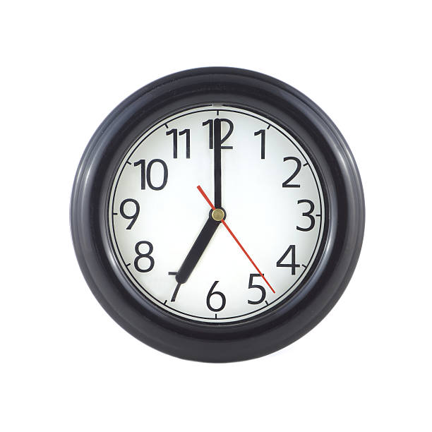 istock Big round wall clock isolated on white close up 503554128