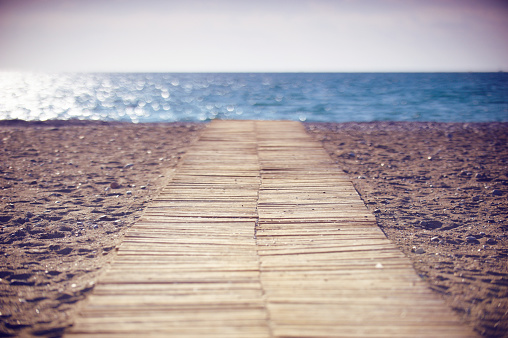 wooden path to the sea