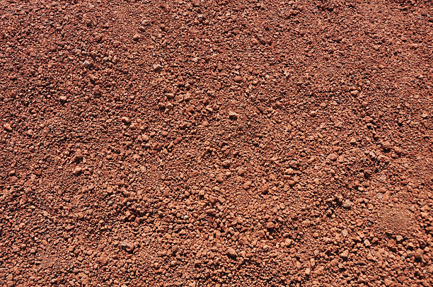 istock red clay background - tennis court 503561046